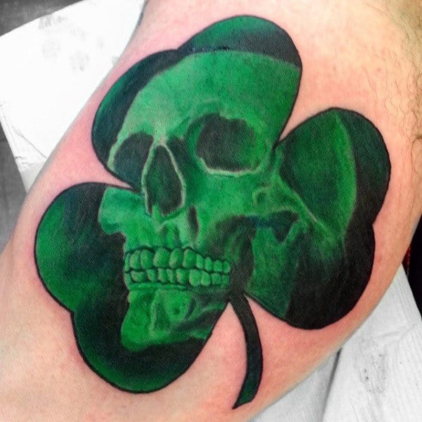 Incredible Shamrock Skull Inner Bicep Guys Tattoos