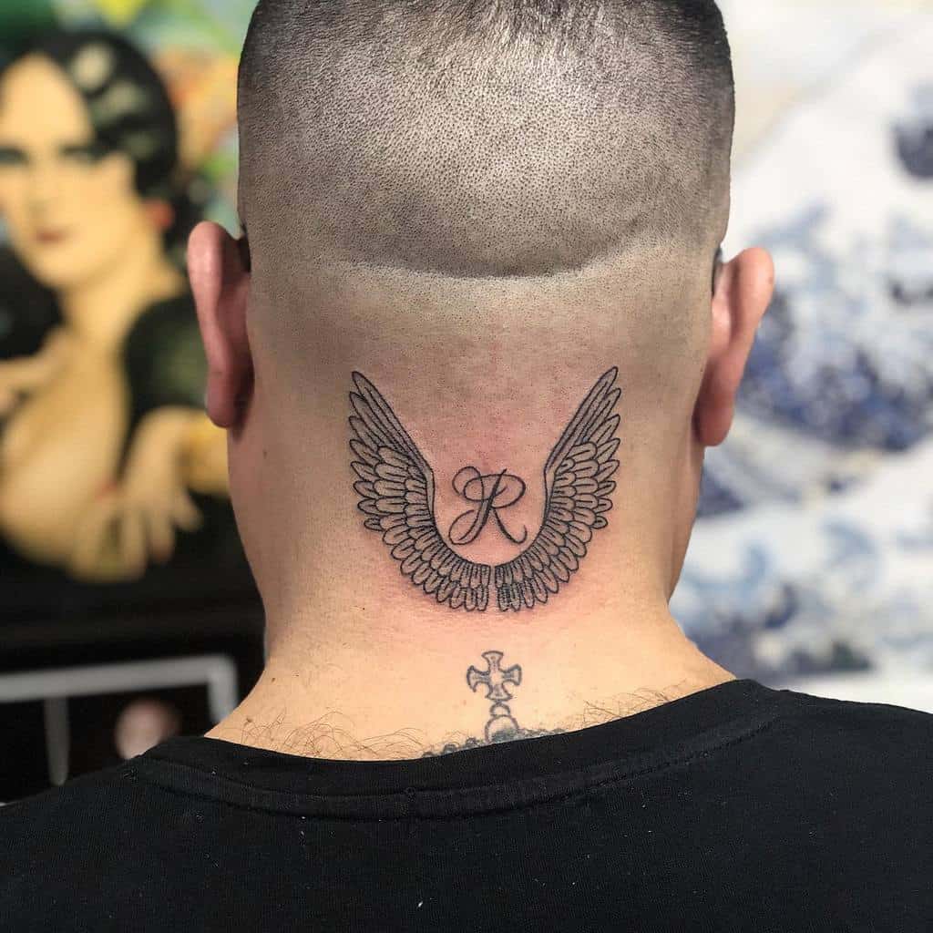 inmemory-guardian-angel-wings-tattoo-cabiriatattoo