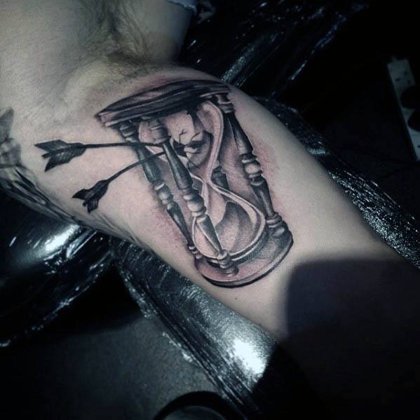 Inner Arm Bicep Arrows In Hourglass With Broken Glass Tattoos For Gentlemen