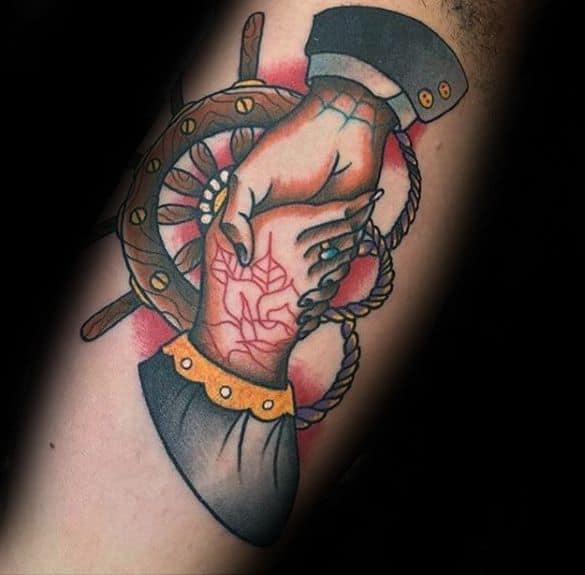Inner Arm Bicep Ship Wheel Handshake Tattoo Design On Man