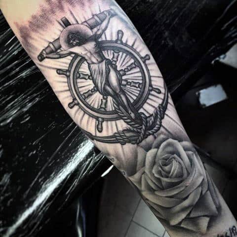 Inner Forearm Anchor Cross With Rose Flower Mens Tattoo Ideas