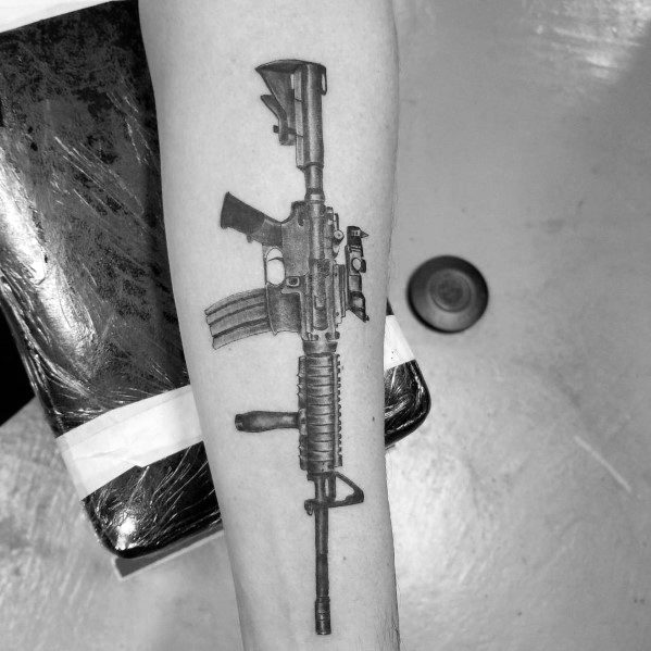 1. Forearm AR 15 Tattoos.