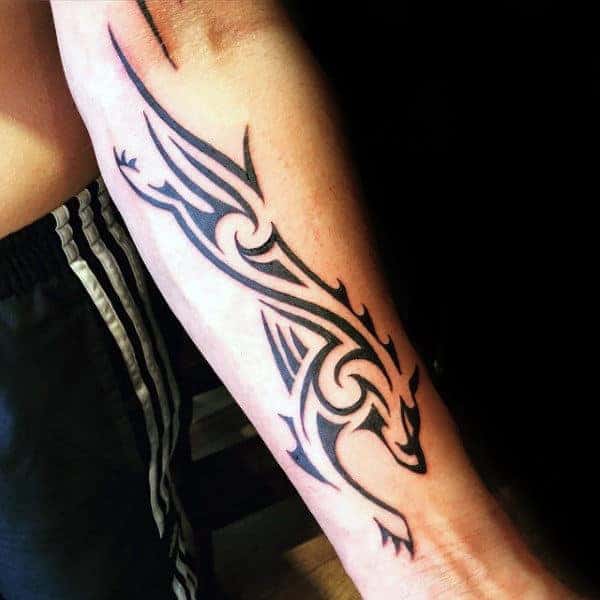 inner-forearm-running-tribal-wolf-male-tattoos