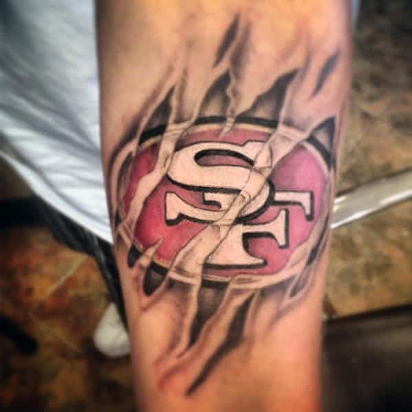 Inner Forearm San Francisco 49ers Ripped Skin Guys Tattoos.