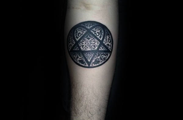Inner Forearm Tattoo On Gentleman Of Decorative Circle Heartagram Design