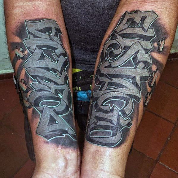 Inner Forearms Graffiti Tattoo Of Wildstyle Wording In Shaded Grey Ink