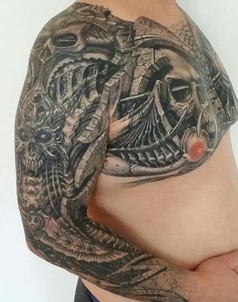 Insane Stone Mens Sleeve And Chest Tattoos With Skulls