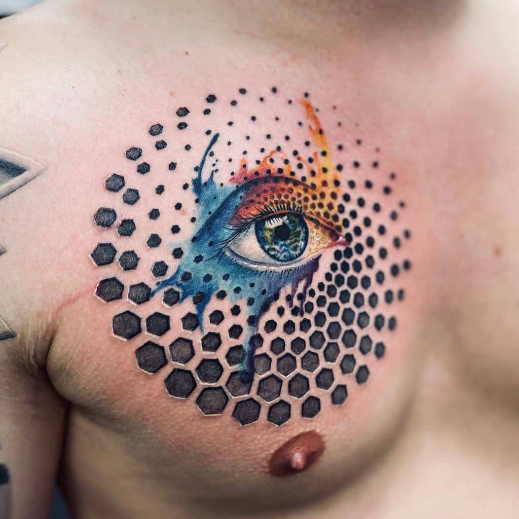 Intense watercolor eye framed by heavy gradient hexagons chest shapes geometric tattoo
