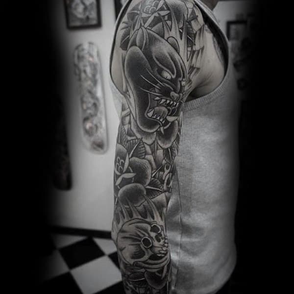 Interesting Male Full Sleeves Angry Leopard And Skull Tattoo