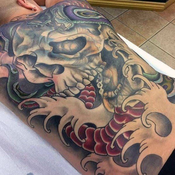 japanese water waves with skull cover up full back tattoos