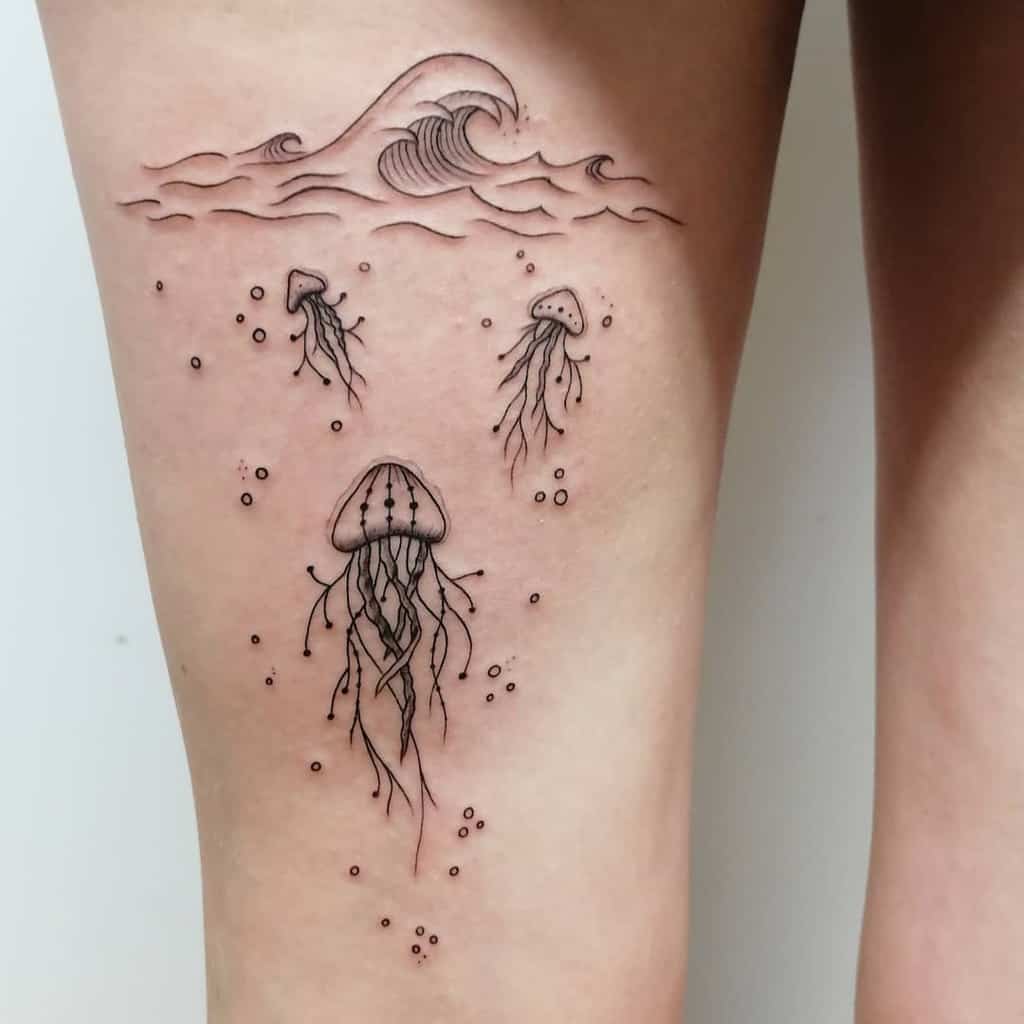 jellyfish-wave-fineline-ocean-tattoo-mehennainspiration