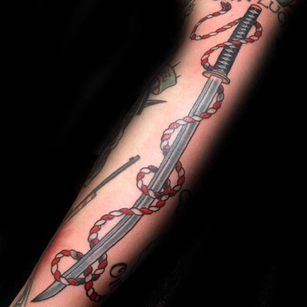 Katana With Red And White Rope Mens Arm Tattoo