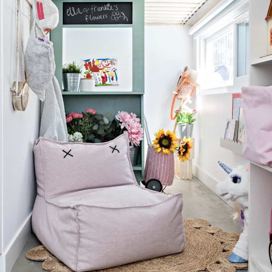small kids reading nook with purple seat