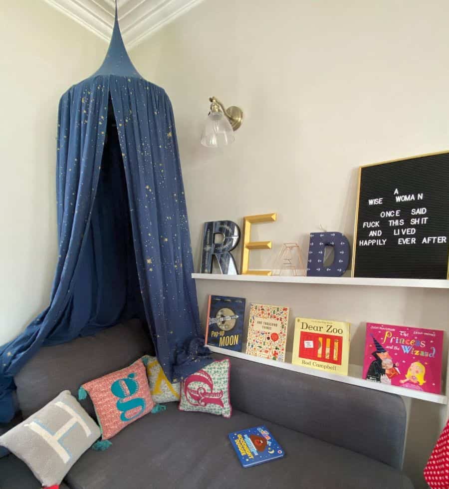 kids reading nook with gray sofa