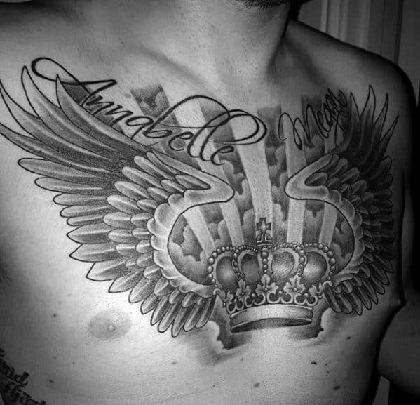 King Crown With Wings And Clouds Male Chest Tattoo.