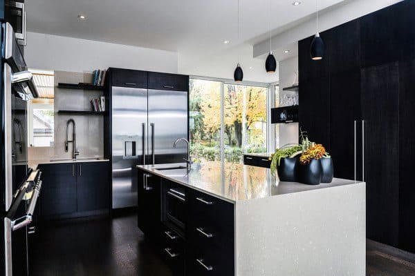 black kitchen cabinets white island modern stainless steel fridge 