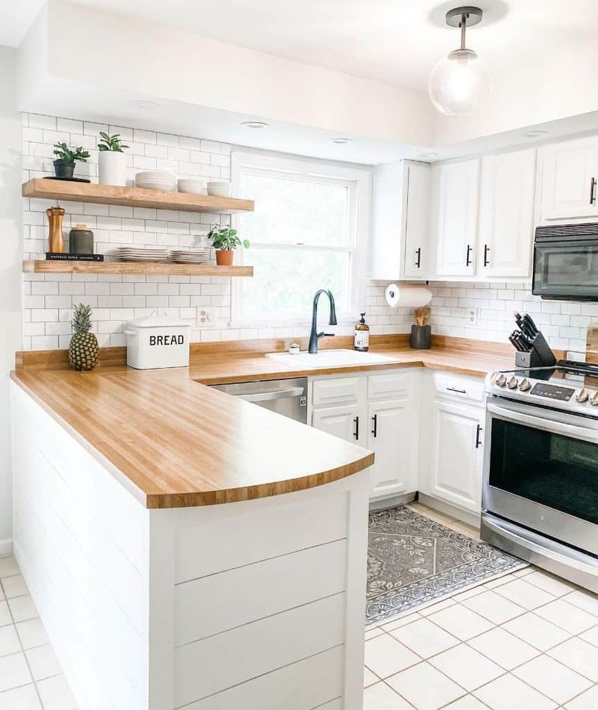 modern farmhosue kitchen with white tile backsplash 
