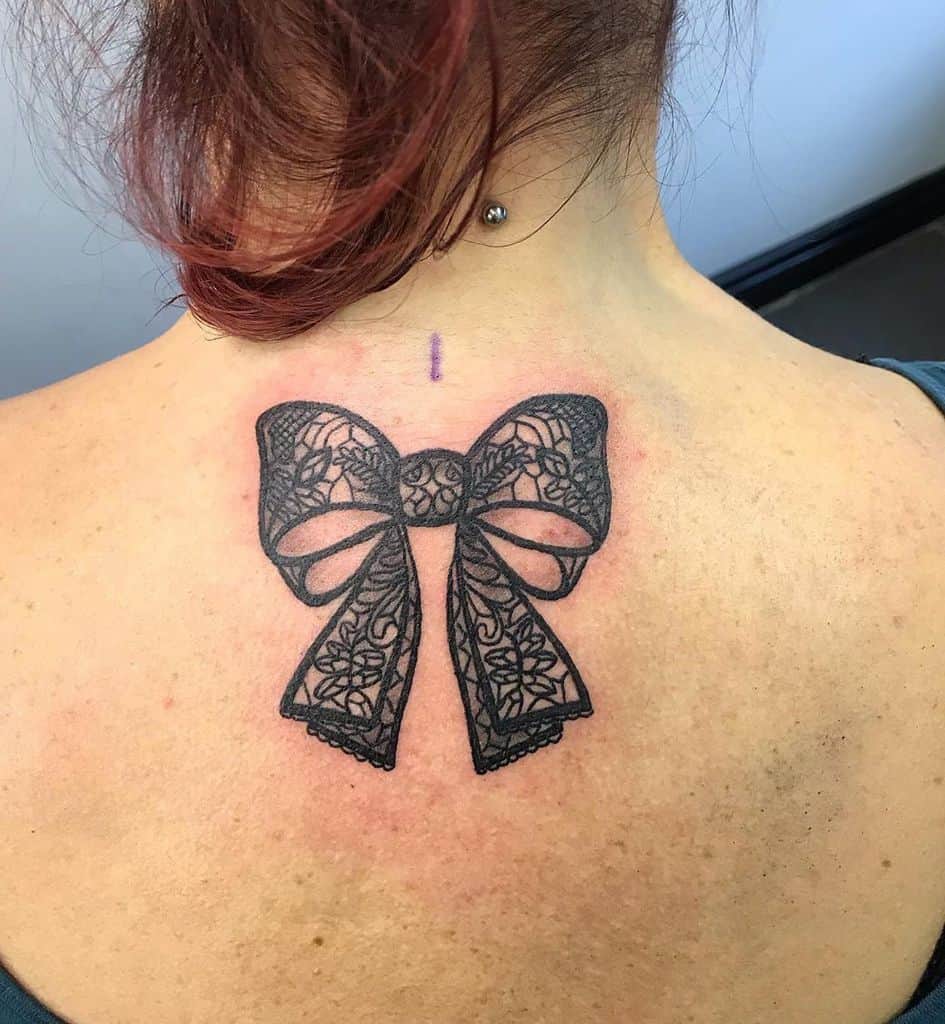 Lace Bow Black And Grey Back Tattoo