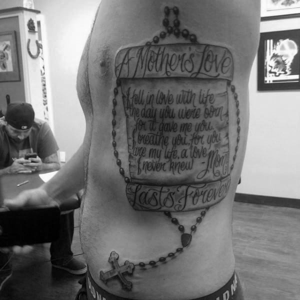 Large Scroll With Rosary Rib Cage Side Tattoo On Gentleman