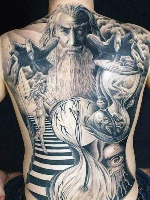Large White Bearded Sorcerer Tattoo With Naked Lady And Hourglass Tattoo Mens Full Back
