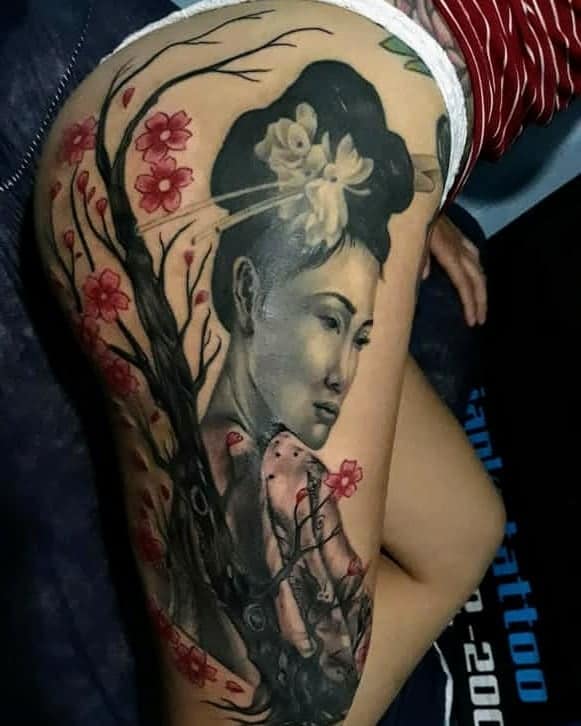 Latino Black And Grey Art Geisha Tattoo