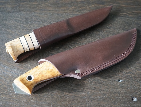 https://nextluxury.com/wp-content/uploads/leather-sheathed-helle-arv-and-utvaer-knives.jpg