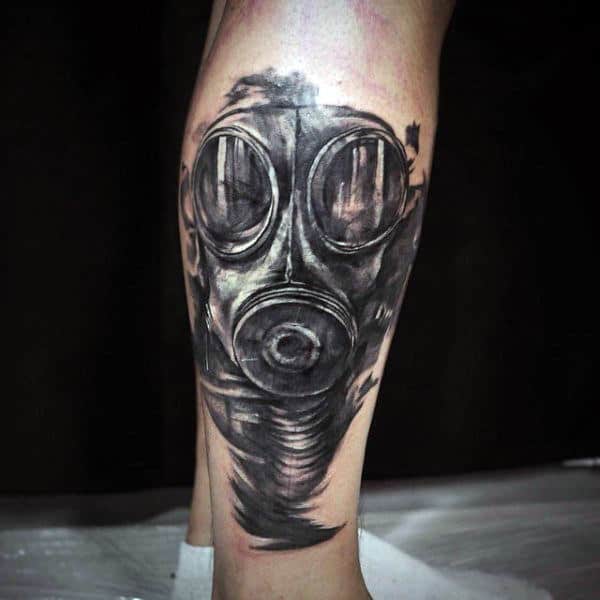 Leg Calf Black Gas Mask Tattoo Design For Males