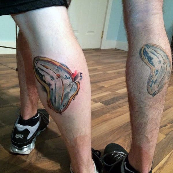 Leg Calf Melting Clock Tattoo On Male