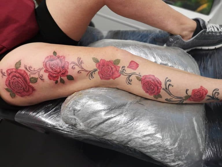 1. Rose Vine Tattoo Designs - wide 2