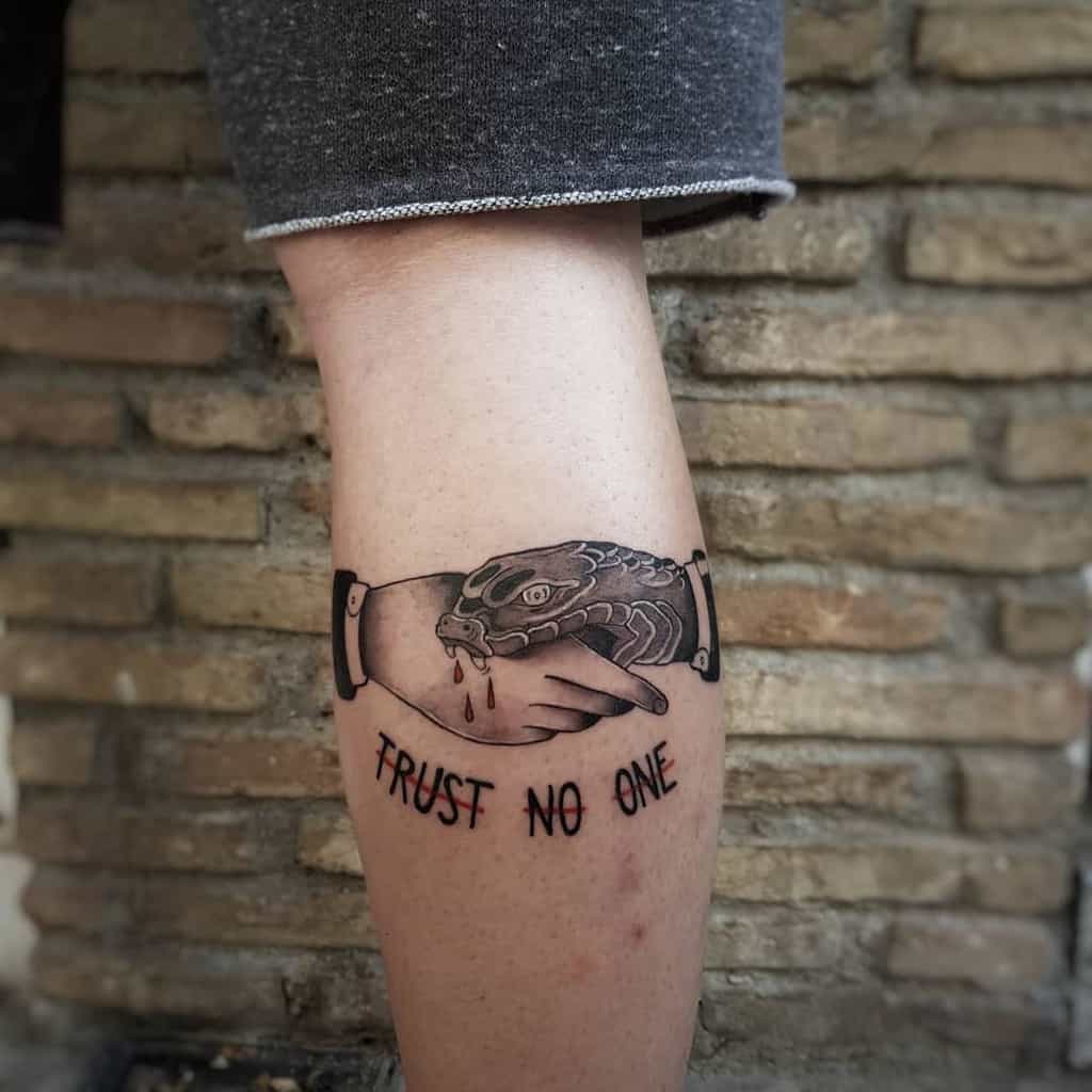 leg trust no one tattoos painciler