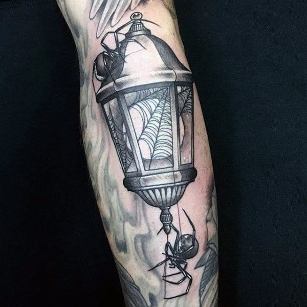 Light With Spider Web Mens Tattoo On Arm