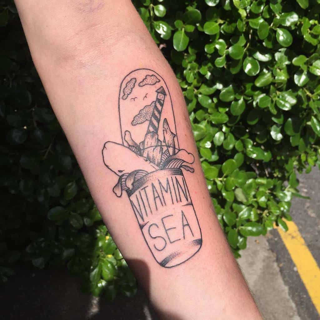 lighthouse-whale-ocean-tattoo-sadsodtattoos