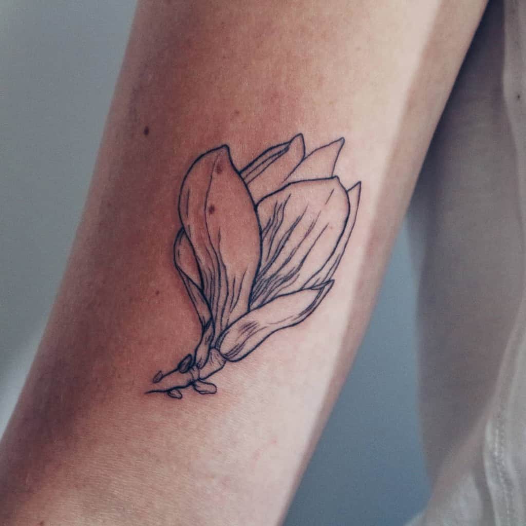 The Magnolia's Spiritual Whisper: Beauty, Transformation, and Enlightenment  in Tattoo Art — 1MM Tattoo Studio