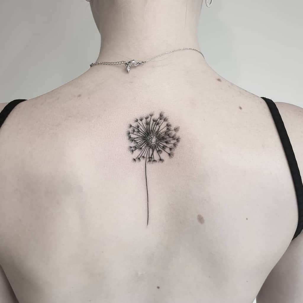 little Dandelion back tattoo