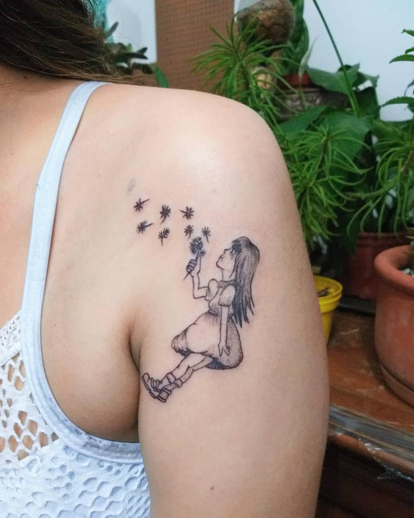 little girl blowing dandelions tattoo