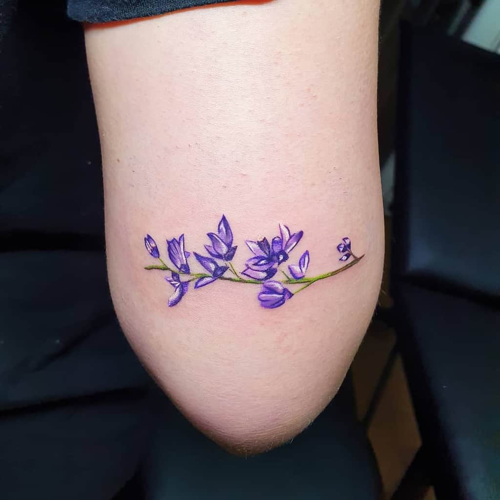 Watercolor style lilac on the ankle
