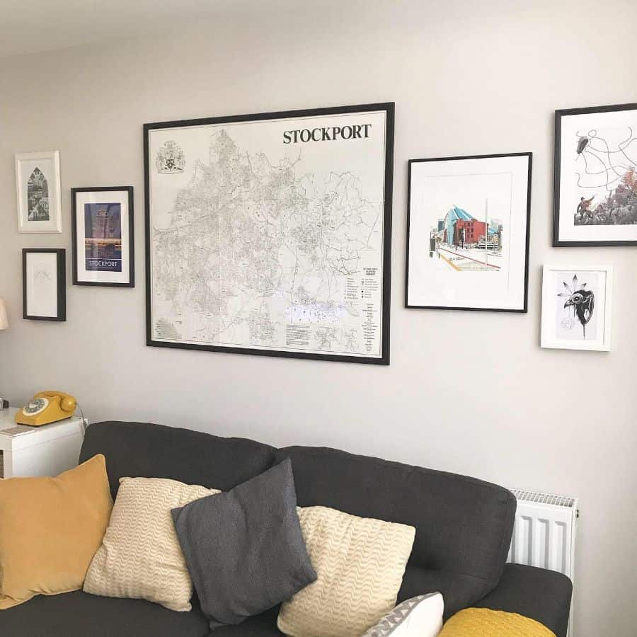 framed map of stockport hanging on living room wall