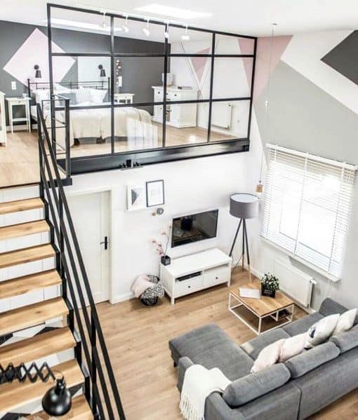 modern loft bedroom hardwood floors gray sofa 