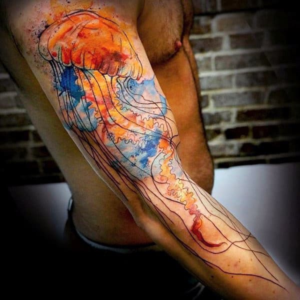 Lovely Watercolor Blasts Jellyfish Tattoo Upper Arm