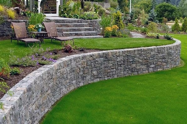 low stone retaining wall grass