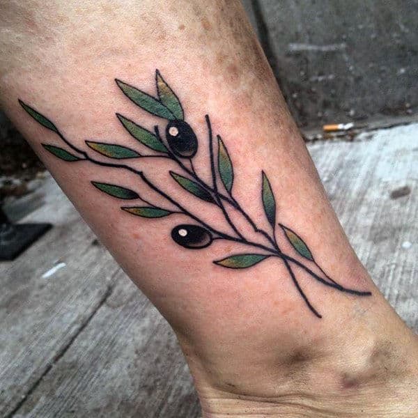 olive branch tattoo on knee with roman on topTikTok Search