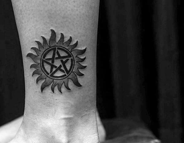 Lower Leg Guys Symbol Anti Possession Tattoo