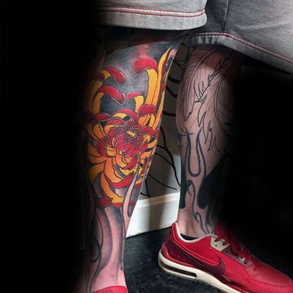 Lower Leg Yellow And Red Chrysanthemum Flower Tattoo On Gentleman