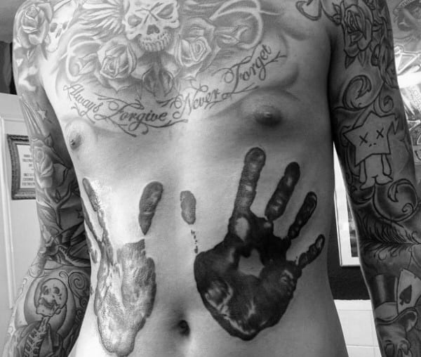 Lower Stomach Handprint Tattoo On Male
