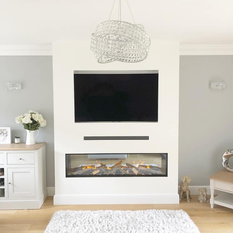 luxurious white fireplace surround wall mounted tv white floor rug