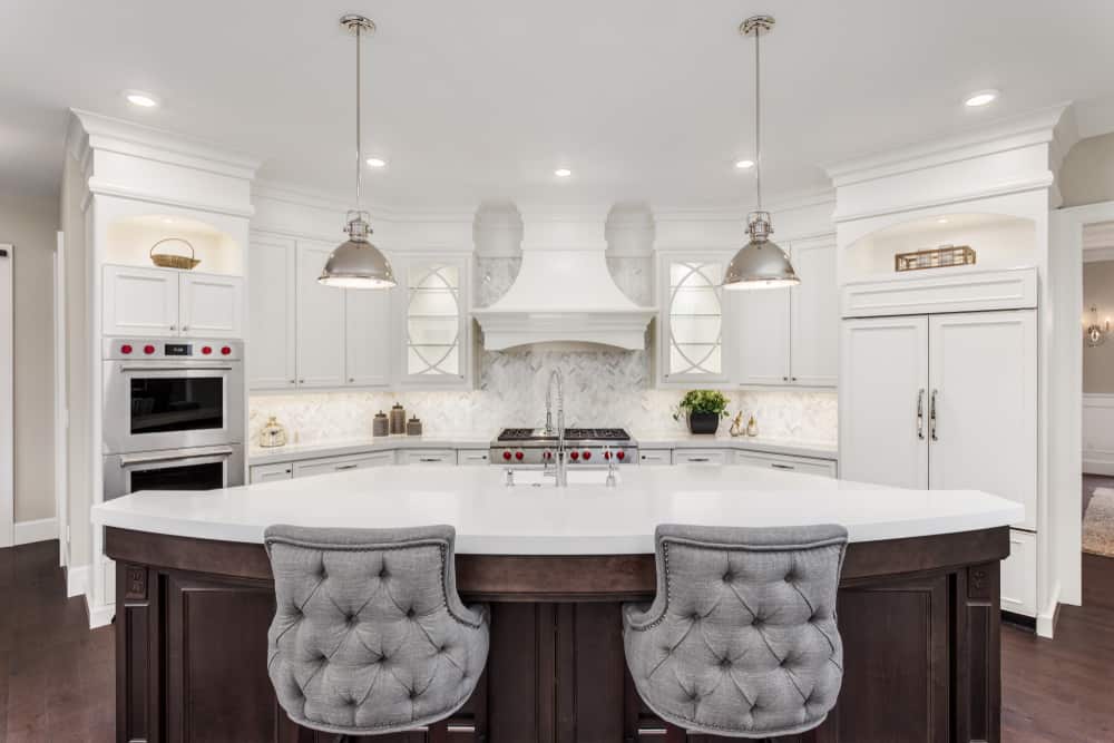 luxury farmhouse kitchen large wood island with marble countertop 