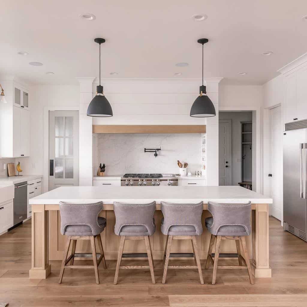 luxury modern farmhouse kitchen white marble top island pendant lights modern appliances 