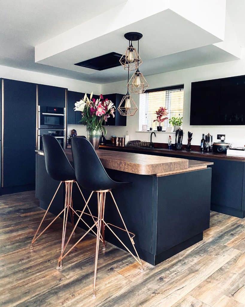 luxury small kitchen island with dark cabinets 