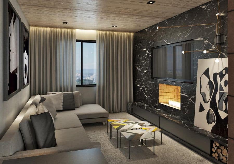 luxury tv room with gray sofa and marble wall