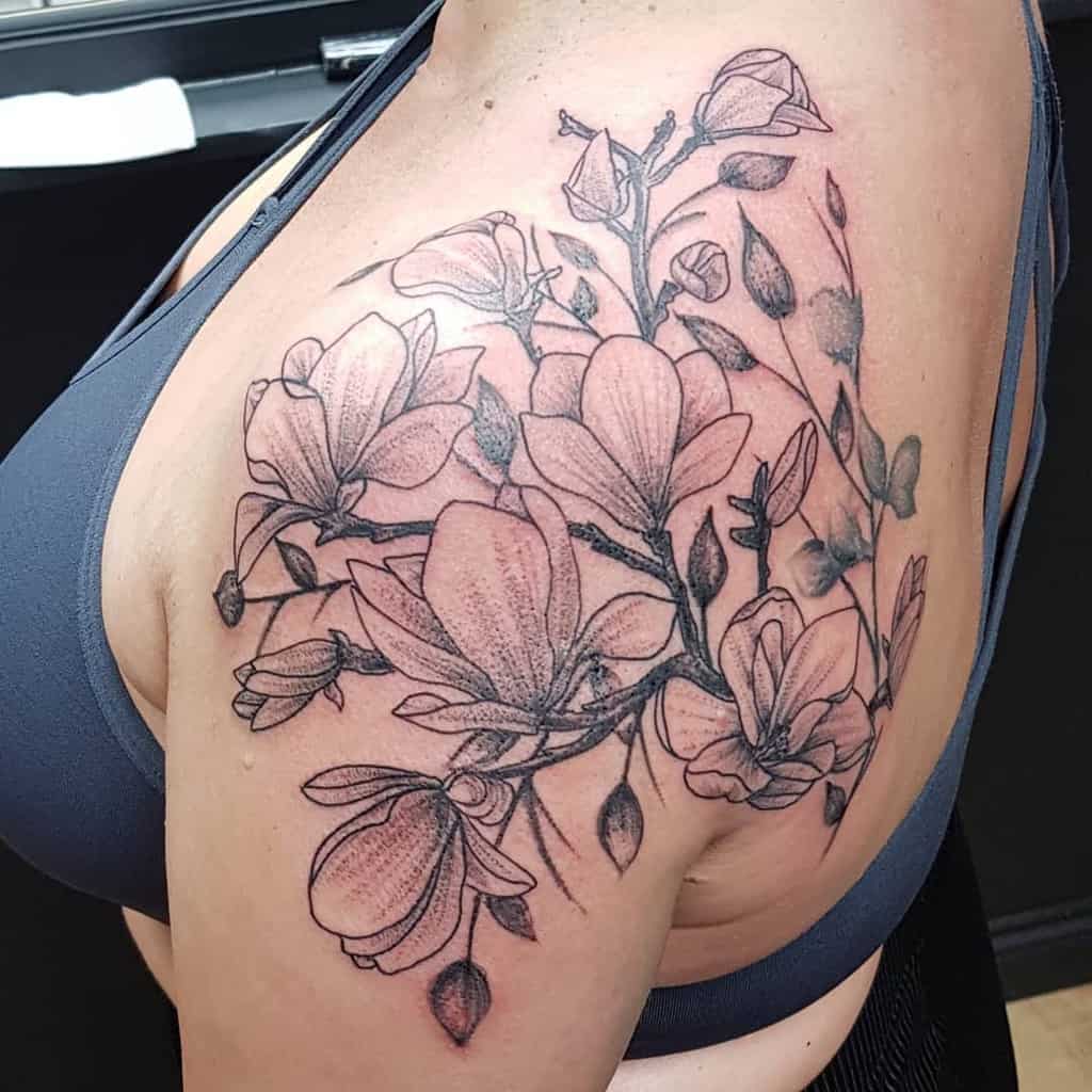 magnolia flower shoulder tattoo izabelant